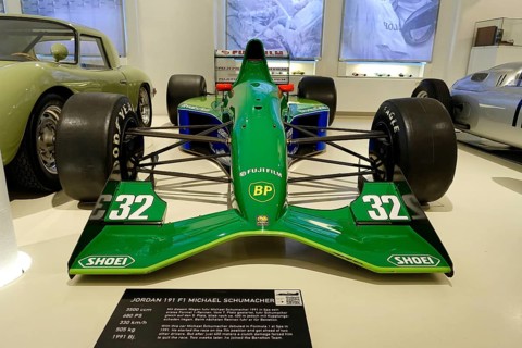 JORDAN 191 F1 Michaels Schumacher's green Jordan Formula 1 car displayed in a car museum,