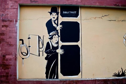 Mural painting, the tramp, charles chaplin, public toilet, Bhubaneswar, Odisha, India, Asia
