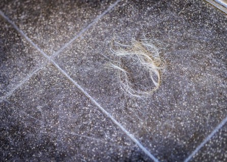 Hair on the floor of a hairdressing salon, taken in the hairdressing salon Coiffeur Sivan in