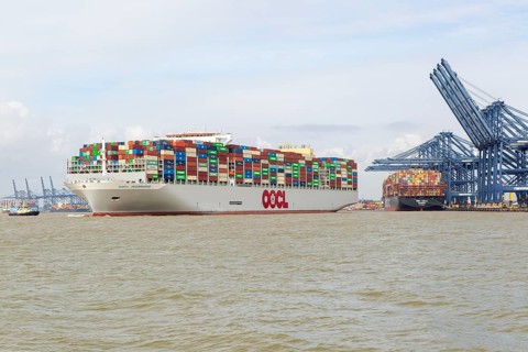 OOCL Zeebrugge container ship leaving quayside departing from Port of Felixstowe, Suffolk, England,