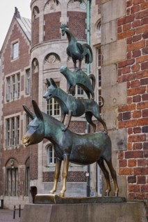 The Bremen Town Musicians as a bronze statue by Gerhard Marcks at the historic town hall in Bremen,