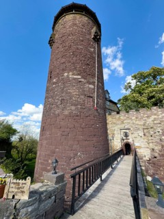 View of large high castle tower of the legendary 13th century fairytale castle Fairytale castle of