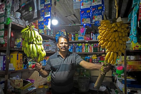 Kiosk vendor in Kavanattinkara, Backwaters, Kerala, India, Asia