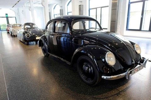 Classic black Volkswagen Beetle in a bright showroom, AUTOMUSEUM PROTOTYP, Hamburg, Hanseatic City