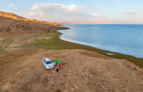 Off-road car camping in the wilderness, Lake Songkoel, Kyrgyzstan, Asia