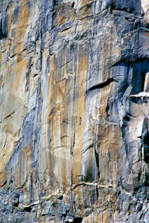 Rock face with climber, Canyon de Chelly National Monument, area of the Navajo Nation in the