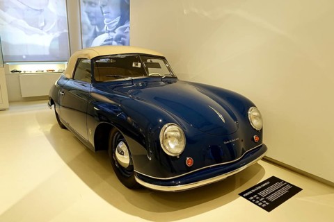 PORSCHE 356 GLASS CABRIOLET, View of a blue-painted coupe of the Porsche 356 type in a car museum,