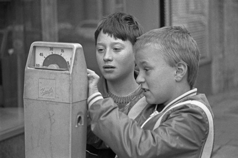 Two boys examining a parking meter, Bamberg, Upper Franconia, Bavaria, Germany, 26 October 1987,