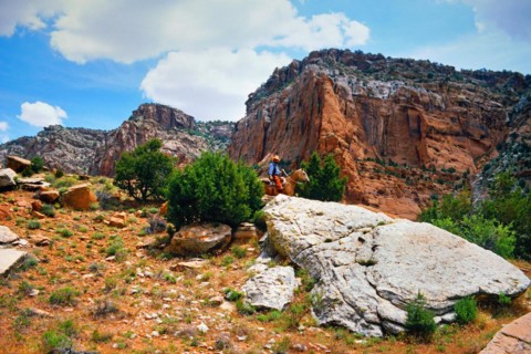 Cowboy between rocks, Canyon de Chelly National Monument, area of the Navajo Nation in the