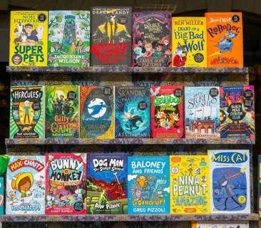 Book display of children's books in shop window of Waterstones bookshop, Ipswich, Suffolk, England,