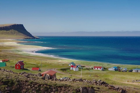 Abandoned houses on a wide bay with sandy beaches, Latrabjarg, Westfjords, Iceland, Europe