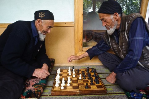 Uzbek men, playing chess, Kyrgyzstan, Asia