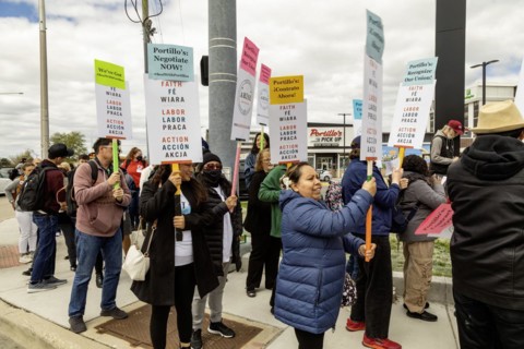 Rosemont, Illinois, Hundreds of workers and supporters picketed a Portillo's restaurant, demanding
