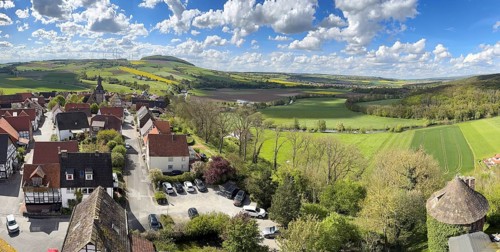 View from large castle tower tower of 13th century castle today castle hotel Trendelburg to village