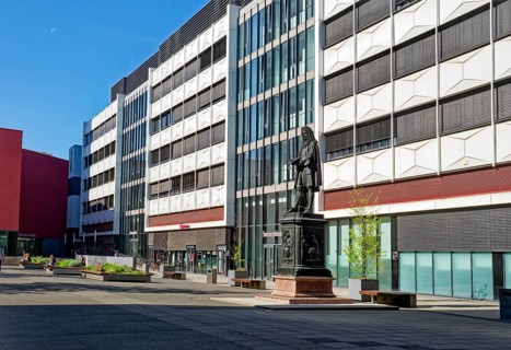Inner courtyard of Leipzig University with the monument to Gottfried Wilhelm Leibniz, Leipzig,