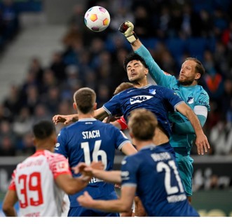 Penalty area scene, goal area scene Fist defence action Goalkeeper Oliver Baumann TSG 1899