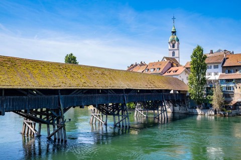 View of an old wooden bridge with an old town in the background, Olten, Solothurn, Switzerland,