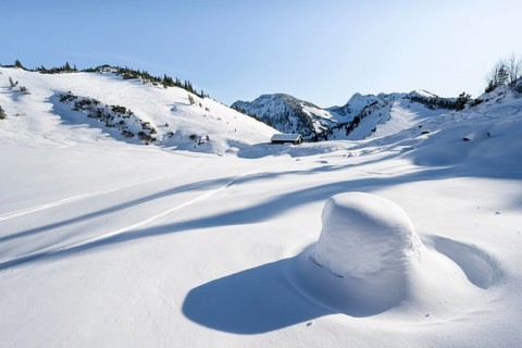 Snow-covered mountain landscape in winter at the Schnittlauchmoosalm, ski tour to the Aiplspitz,