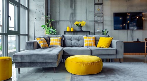 Modern living room in a condo or loft with modern trendy furniture a grey couch and yellow pillows,
