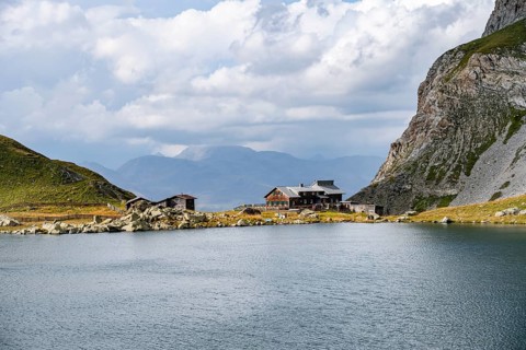 Obstanserseehuette mountain hut on the Obstansersee mountain lake, Carnic main ridge, Carnic High
