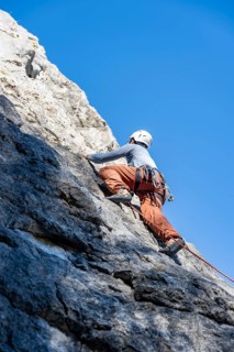 Sport climbing with rope, climber on a rock face, Frauenwasserl climbing garden, Ammergau Alps,