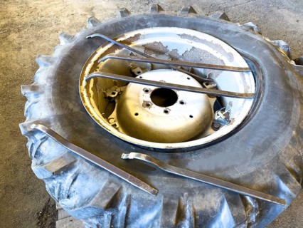 Changing the Wheel of a Tractor with Tools in Switzerland