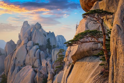 View of stones and rock formations from Ulsanbawi rock peak on sunset. Seoraksan National Park,