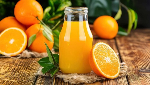 A small bottle of orange juice, half and whole orange on a rustic table, AI generated, AI generated
