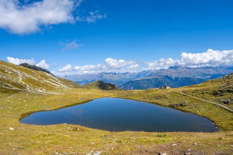Small mountain lake with mountain panorama, Carnic Main Ridge, Carnic High Trail, Carnic Alps,
