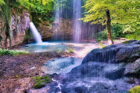 Waterfall in the forest with a small pond, Canton Basel-Landschaft, Switzerland, Europe