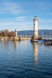 Harbour entrance of Lindau harbour, pier with New Lindau Lighthouse and Bavarian Lion, in the