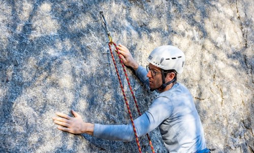 Sport climbing with rope, climber on a rock face, Frauenwasserl climbing garden, Ammergau Alps,