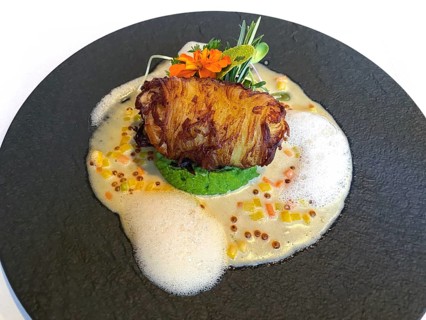 Monkfish in a potato coat, pea puree and caviar foam, Stuttgart Baden-Wuerttemberg, Germany, Europe