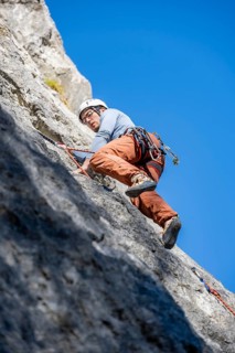Sport climbing with rope, climber on a rock face, Frauenwasserl climbing garden, Ammergau Alps,