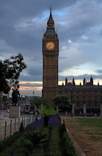 Big Ben at dusk, Bridge Street, SW1, on the left the statue of Winston Curchill, London, England,