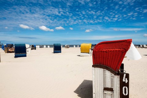 Beach chairs on the sandy beach, Harlesiel, Carolinensiel, East Frisia, Lower Saxony, Germany,