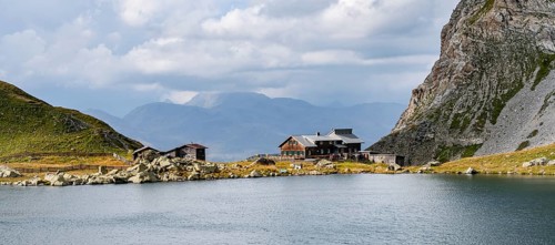 Obstanserseehuette mountain hut on the Obstansersee mountain lake, Carnic main ridge, Carnic High