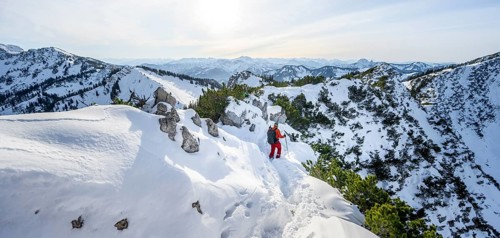 Mountaineer on the ridge of the Aiplspitz in the snow, snow-covered mountain landscape with
