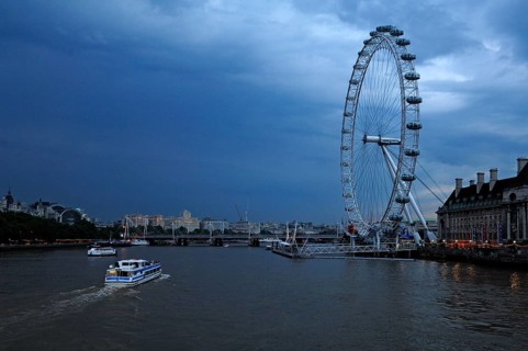 Ferris wheel (135m high) on the Thames near Westminster Bridge at dusk, London, England, Great