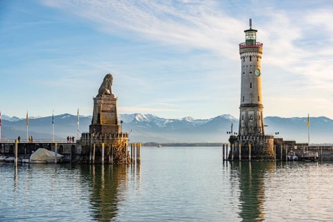 Harbour entrance of Lindau harbour, pier with New Lindau Lighthouse and Bavarian Lion, in the