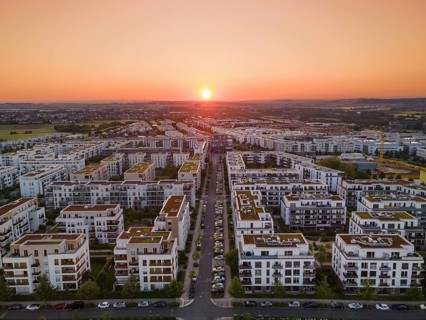 The sun rises over the Riedberg district of Frankfurt. (Aerial view with a drone), Riedberg,