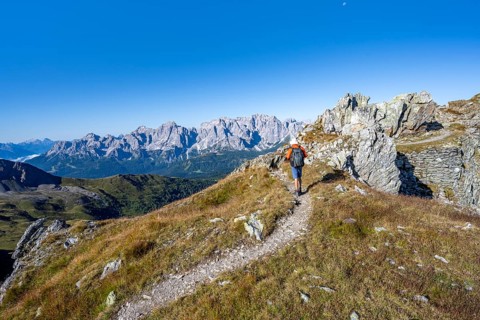 Mountaineers on a hiking trail, old war positions from the First World War, mountain panorama, view