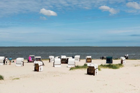 Beach chairs on the sandy beach, Harlesiel, Carolinensiel, East Frisia, Lower Saxony, Germany,