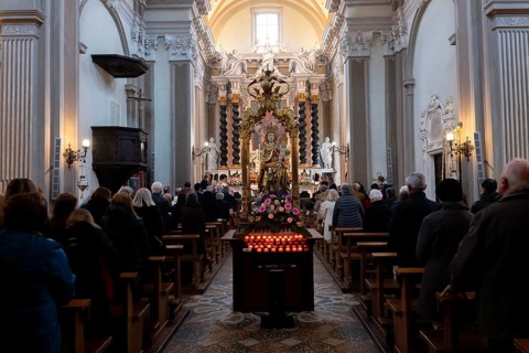 People Praying Inside the Church of San Nazzaro (Croglio) in Castelrotto, Ticino, Switzerland,