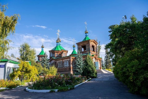 Russian Orthodox Church Cathedral of the Holy Trinity, wooden church with green spires, Karakol,