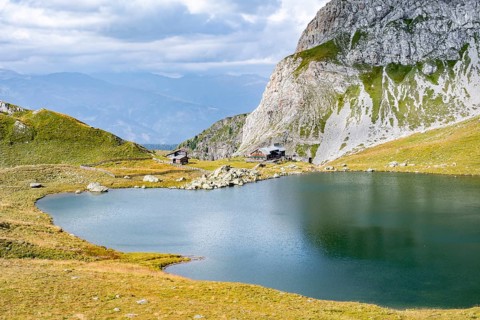 Obstanserseehuette mountain hut on the Obstansersee mountain lake, Carnic main ridge, Carnic High