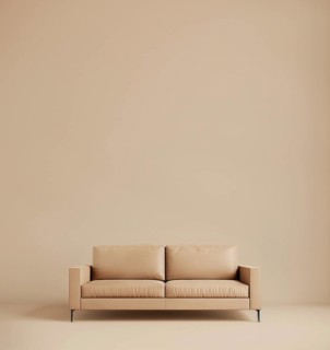 Beige fabric sofa isolated on beige background. AI generated