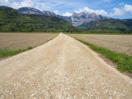 Field path leads through farmland, mountain range behind, near Woerschach, Ennstal, Styria,