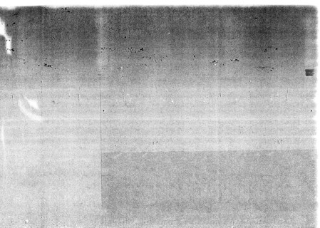 Dark grunge dirty photocopy grey paper texture useful as a background