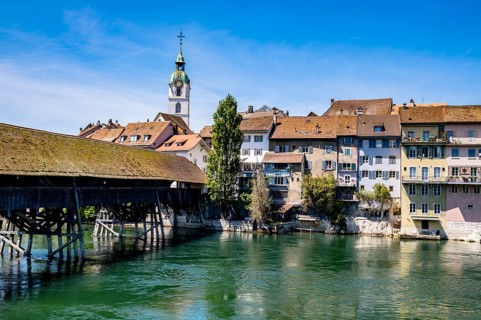 View of an old wooden bridge with an old town in the background, Olten, Solothurn, Switzerland,
